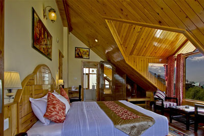 Super Deluxe Cottage living room with Buddhist fireplace