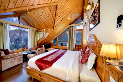 Super Deluxe Cottage grand balcony — Foghills Manali